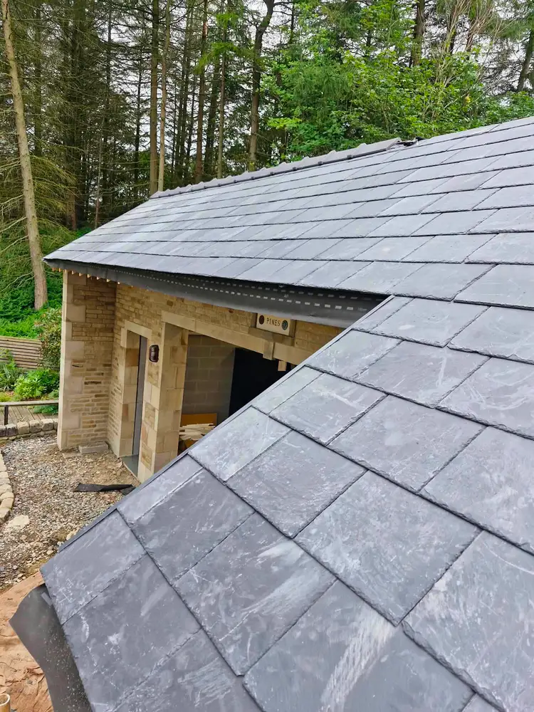 New slate roof on a stone new-build property